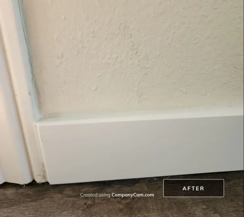 After: water damage and baseboard repair